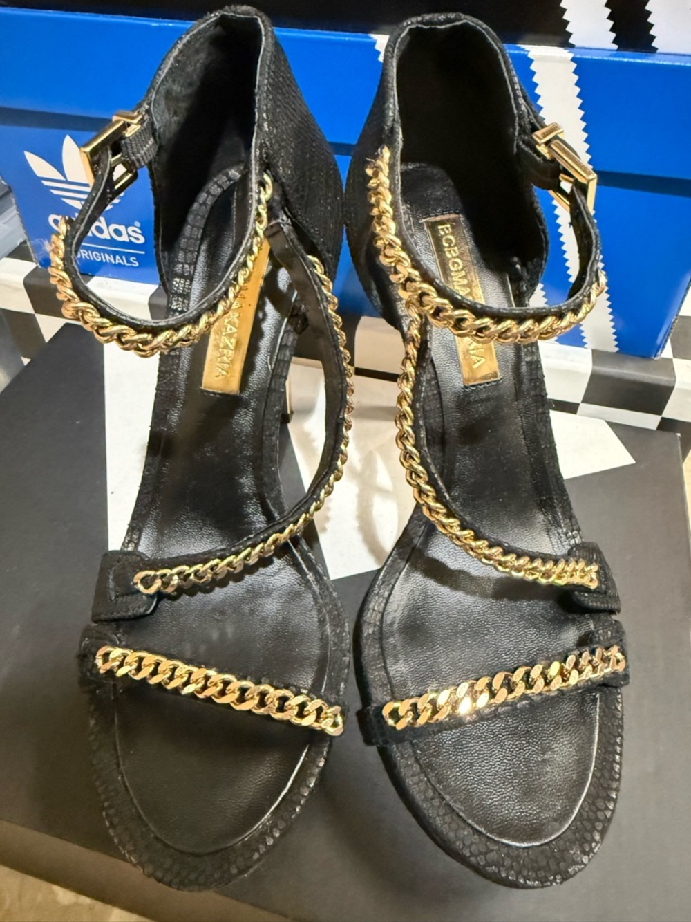 BCBGMaxAzria Black and Gold Chain-Strap Heeled Sandals